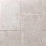 Floor of warm grey stone effect porcelain floor tiles with Beige grout