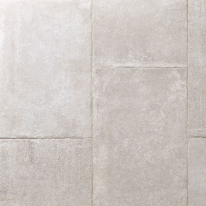 Floor of warm grey stone effect porcelain floor tiles with Beige grout