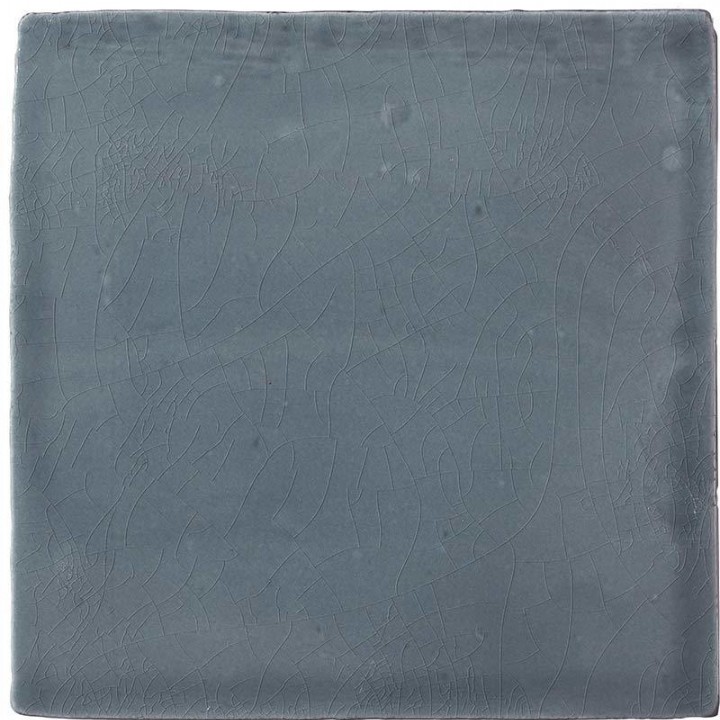 Cut out of a square dark grey blue crackle glazed handmade wall tile perfect for kitchen and bathrooms