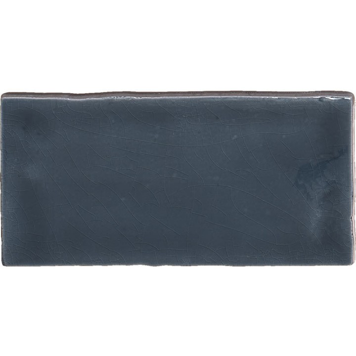 Cut out of a metro dark navy blue crackle glazed artisan wall tile perfect for kitchen and bathrooms