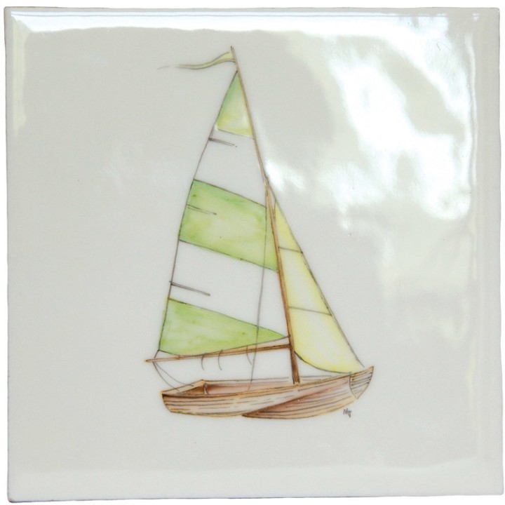 A cut out of an antique white square tile with sailing dinghy illustration