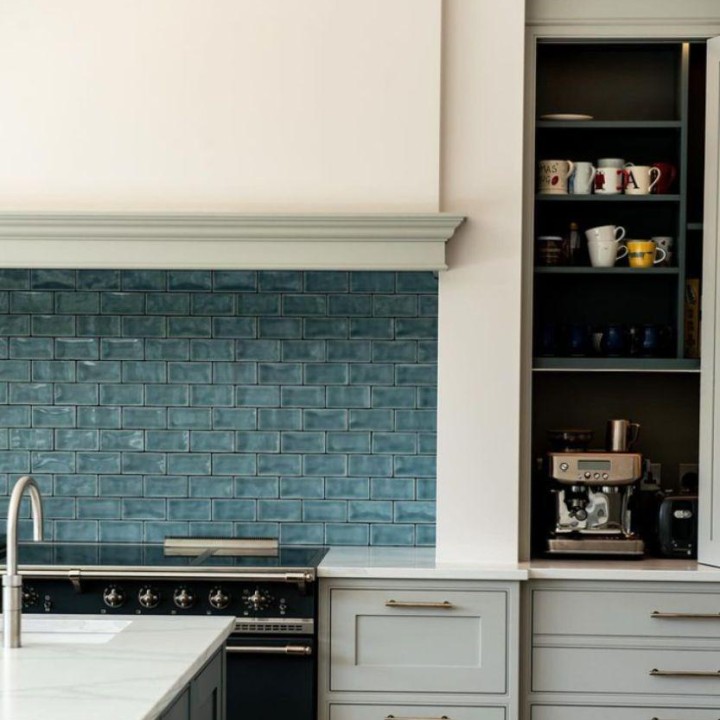 Chello Interior Design Seasons Babbling brook blue wall tiles behind range cooker in kitchen