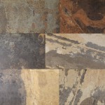 Floor of rectangle slate effect porcelain floor tile with an earthy mixture of colours with rusty red, brown and grey