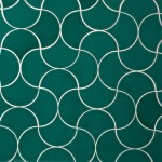 Wall of bottle green scallop tiles with white grout laid in a fish scale pattern ideal for kitchens and bathrooms