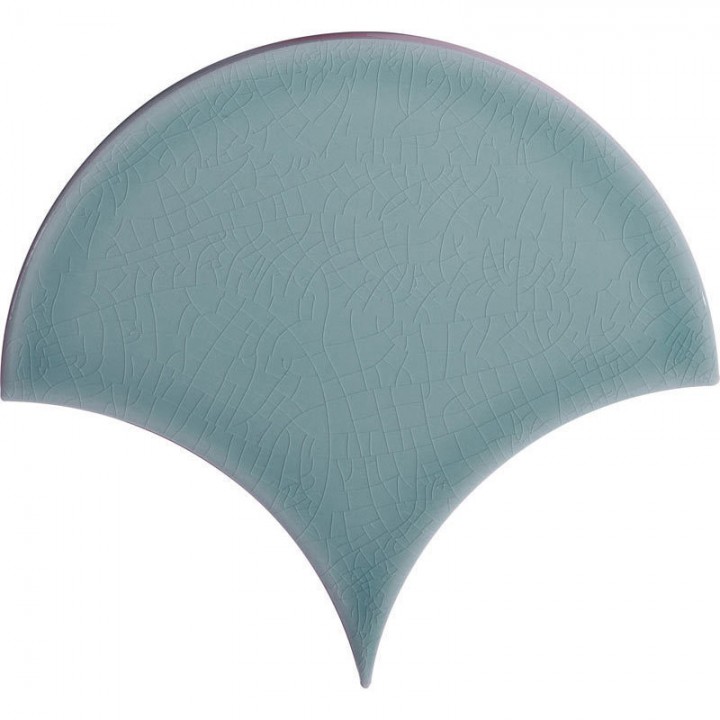 Cut out of a pale green blue scallop tile with a crackle glaze finish