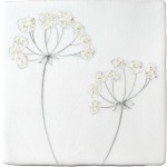 Cut out of a white square tile with a cow parsley illustration in a charcoal style