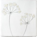 Cut out of a white square tile with a cow parsley illustration in a charcoal style
