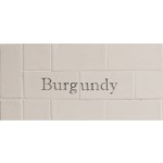 Cut out of two word metro tiles with the word 'Burgundy' hand painted on them