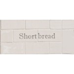 Cut out of two word metro tiles with the words 'shortbread' handpainted on them
