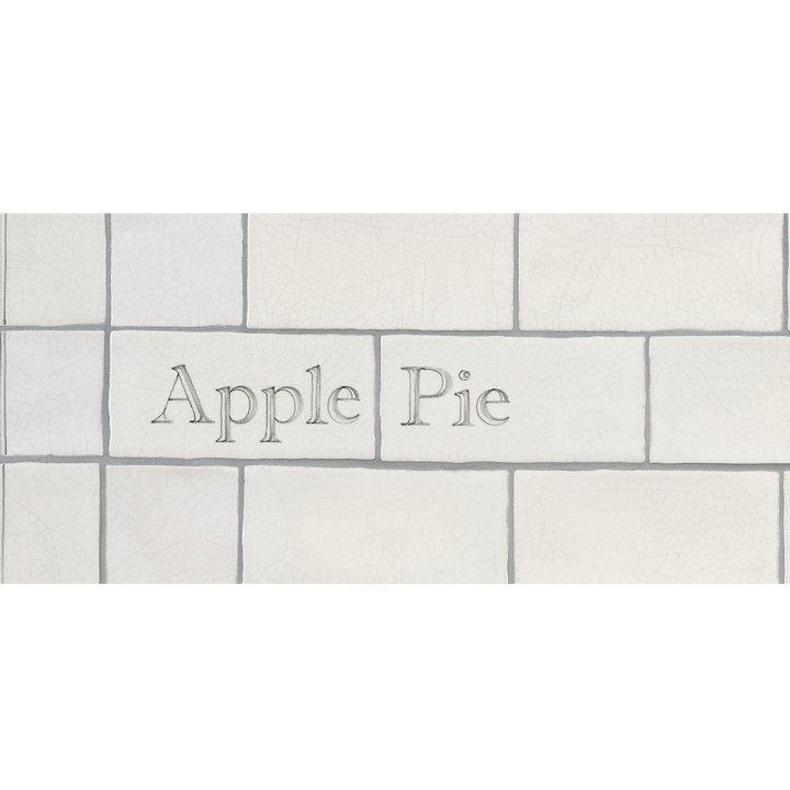 Cut out of two word metro tiles with the word 'Apple Pie' hand painted on them