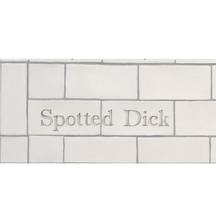 Cut out of two word metro tiles with the word 'Spotted Dick' hand painted on them