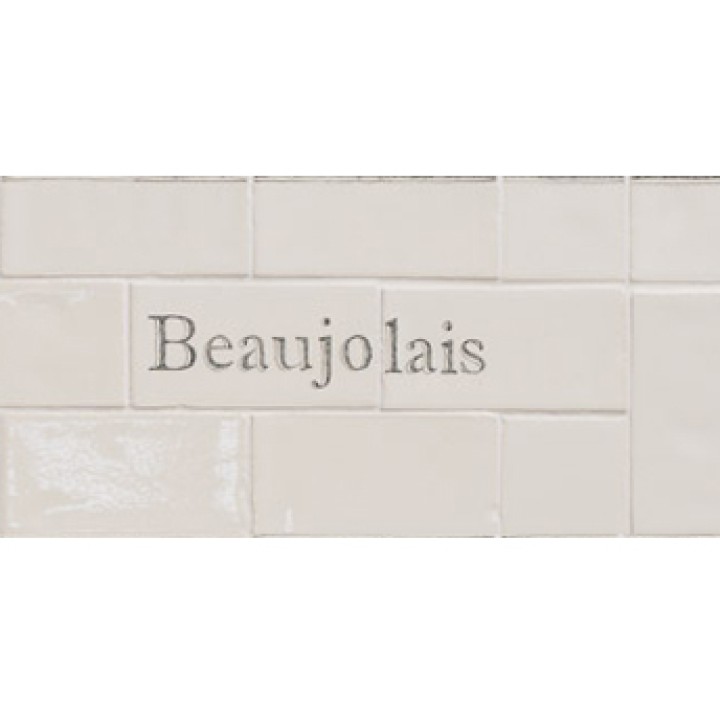 Cut out of two word metro tiles with the word 'Beaujolais' hand painted on them