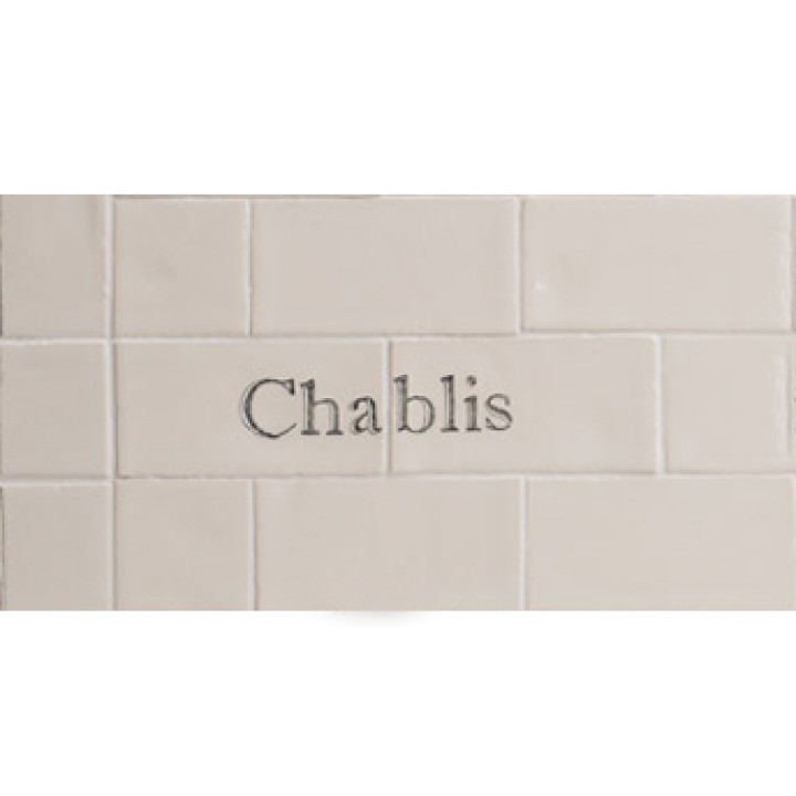 Cut out of two word metro tiles with the word 'Chablis' hand painted on them
