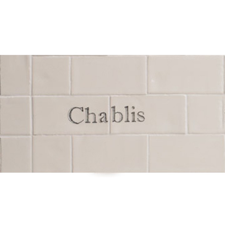 Cut out of two word metro tiles with the word 'Chablis' hand painted on them