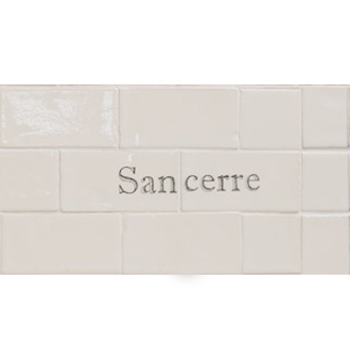 Cut out of two word metro tiles with the word 'Sancerre' hand painted on them