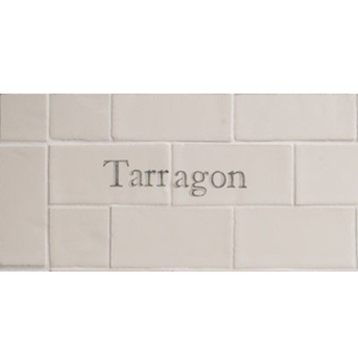 Cut out of two word metro tiles with the word 'Tarragon' hand painted on them