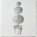 A cut out of an antique white square tile with topiary illustration in a charcoal style