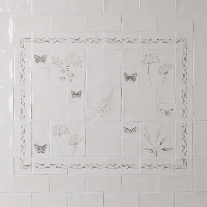 Tiled splashback with a compilation of wild grasses and butterflies with ornate borders