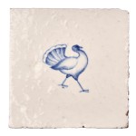 Cut out image of white tile with handpainted delft blue bustard illustration