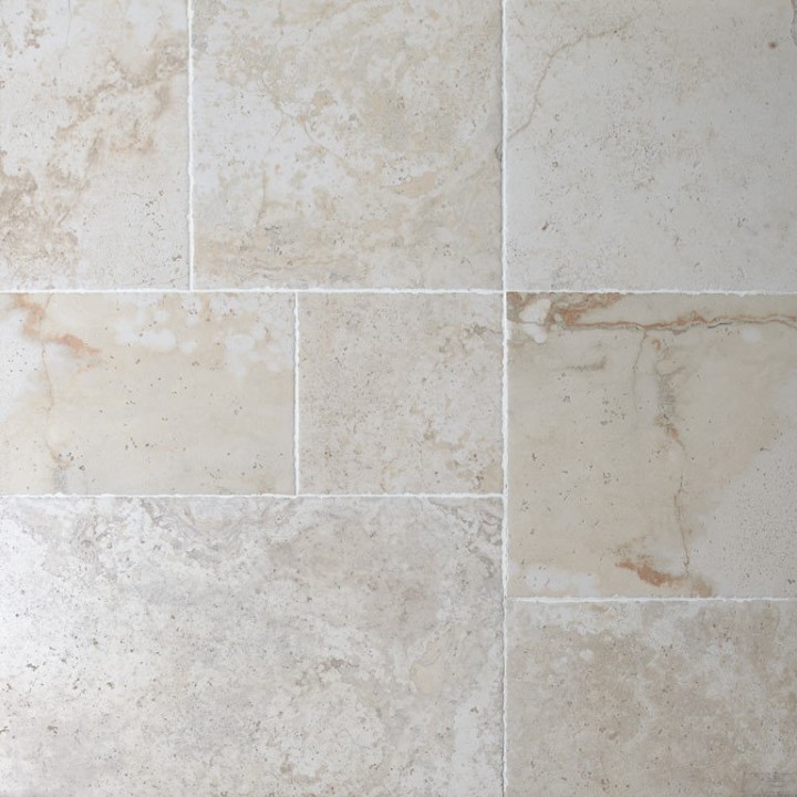 Floor of york stone effect porcelain floor tile mix of sizes with white grout