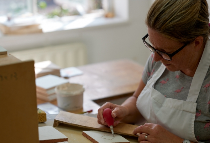 The tiles are hand decorated by our artists at our studio in Marlborough.