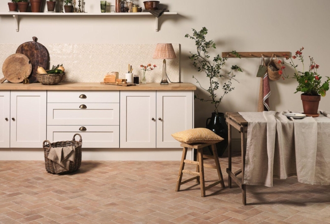 Small brick terracotta style porcelain floor tiles from the Andalucia collection laid in a Herringbone pattern
