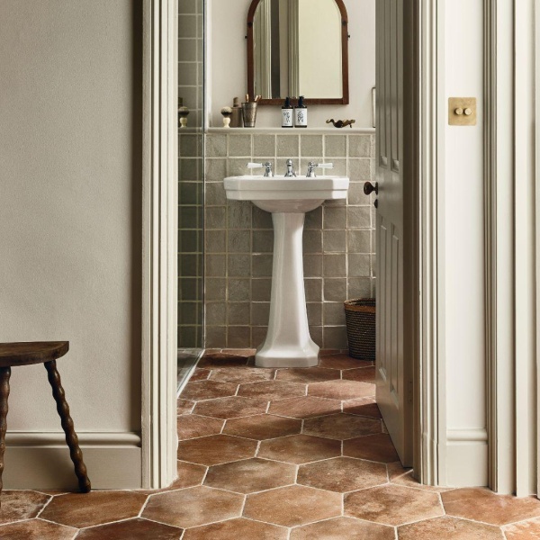 Hexagon shaped terracotta effect porcelain tiles in Granada, from our Andalucia collection on a bathroom floor