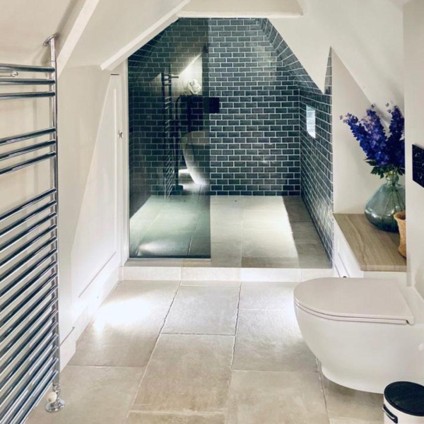 This luxury family bathroom designed by Jess Weeks Interiors has been a real hit on Instagram. Jess paired Manton Hollow tiles from our Savernake collection with Ridgeway flagstones in Wessex for the floors.