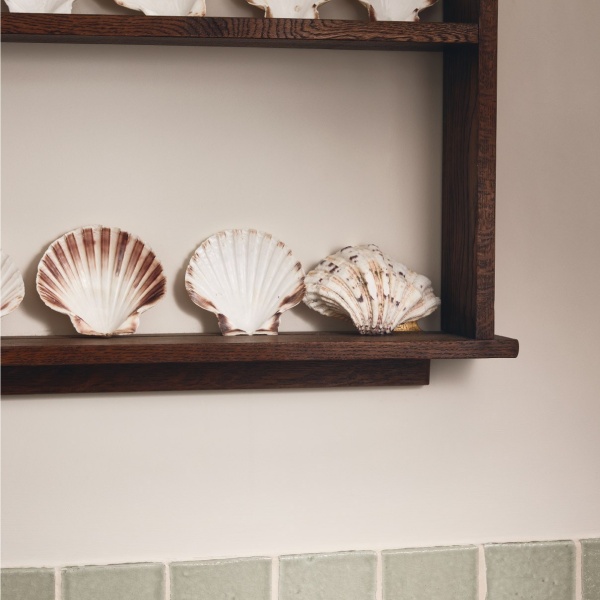 Pale green square tiles in autumnal bathroom