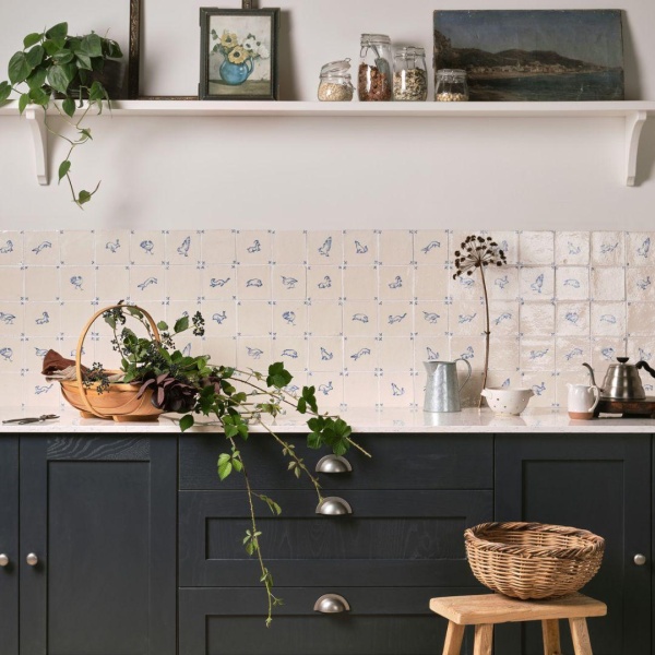 Hand painted Delft tiles with creatures from British wildlife
