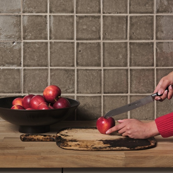 Handmade earthy brown tiles in a kitchen