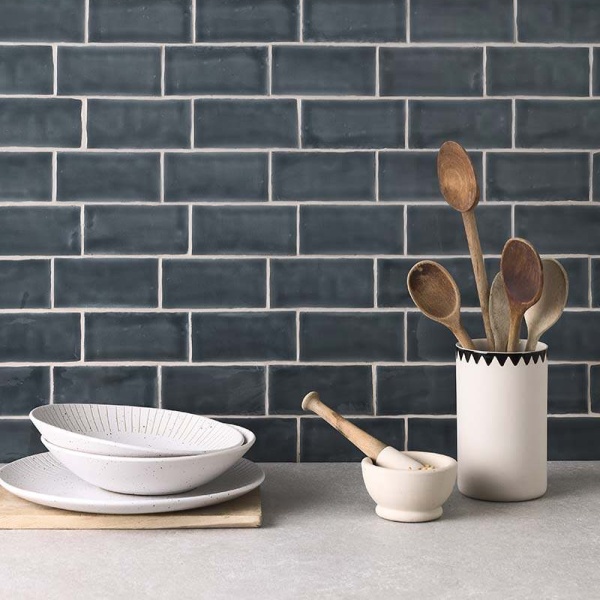 Kitchen sideboard with dark grey-blue small brick tiles