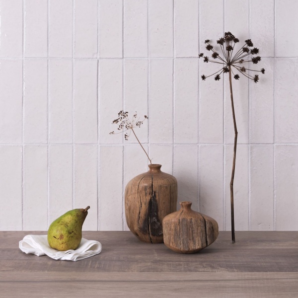 A kitchen sideboard with skinny metro tiles in warm white