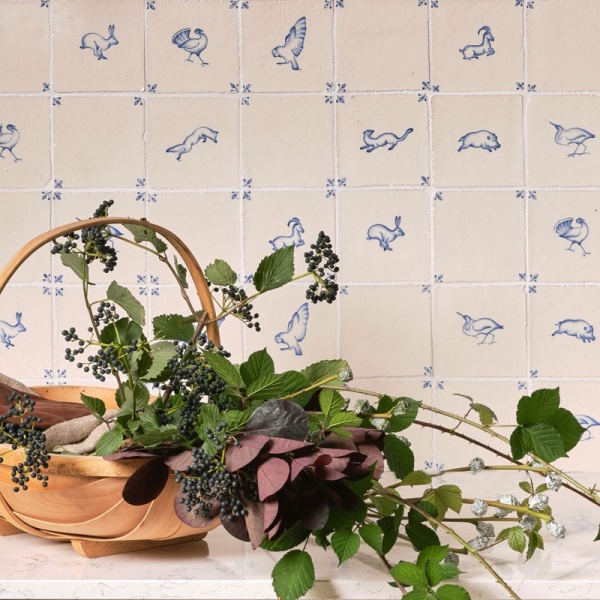Hand painted Delft tiles with playful and untamed animals from the English countryside.