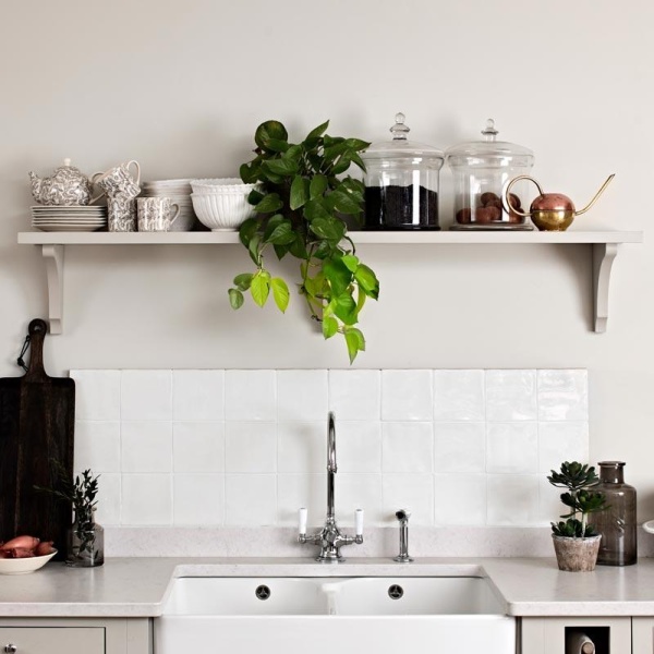 This fresh and clean kitchen sink splash-back features Ivory square tiles from our Elements collection, with white grout..