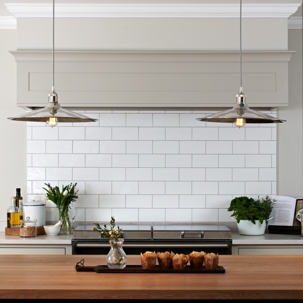 A smart and sophisticated range cooker panel featuring Alabaster large brick tiles from our Simplicity collection.